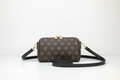 Brown monogram barrel crossbody bag front view